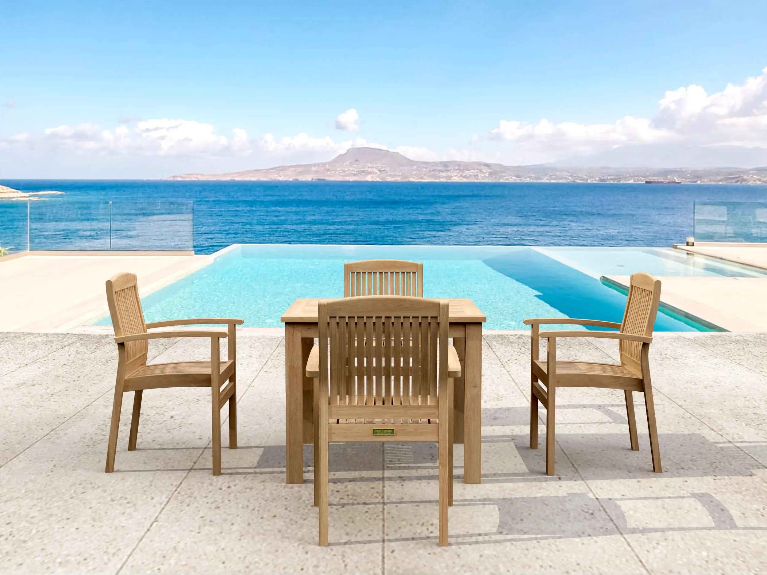 Bistro 5-piece teak dining set with stackable chairs on a poolside patio overlooking the ocean, TechNest Outdoors.
